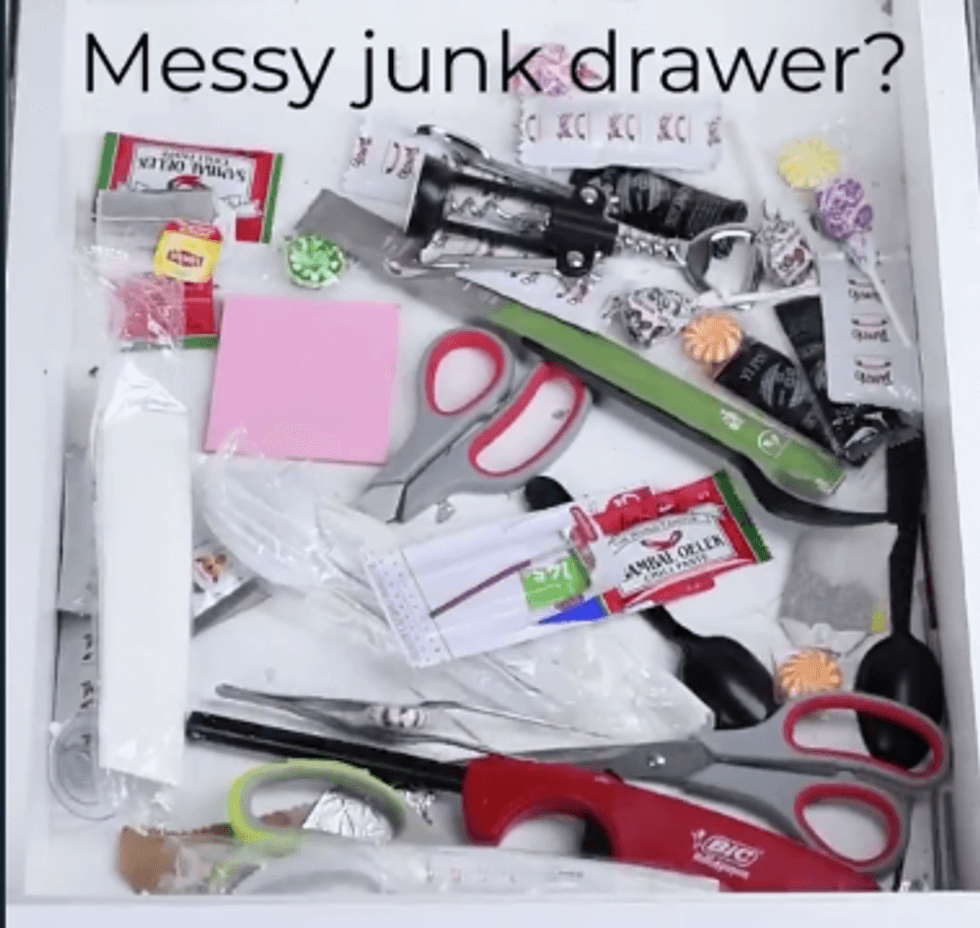 A drawer full of mess and miscellaneous items