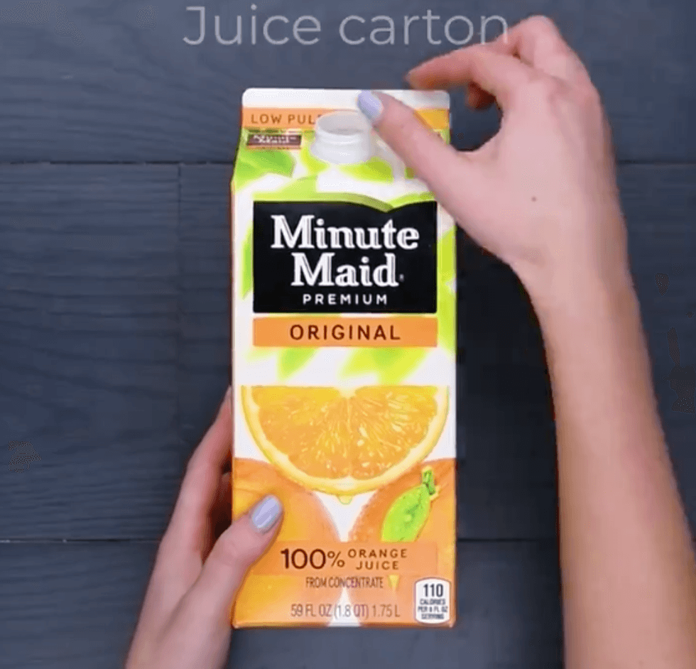An orange juice carton