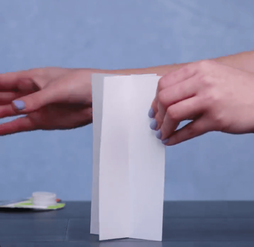 The two rectangles slot together to stand upright